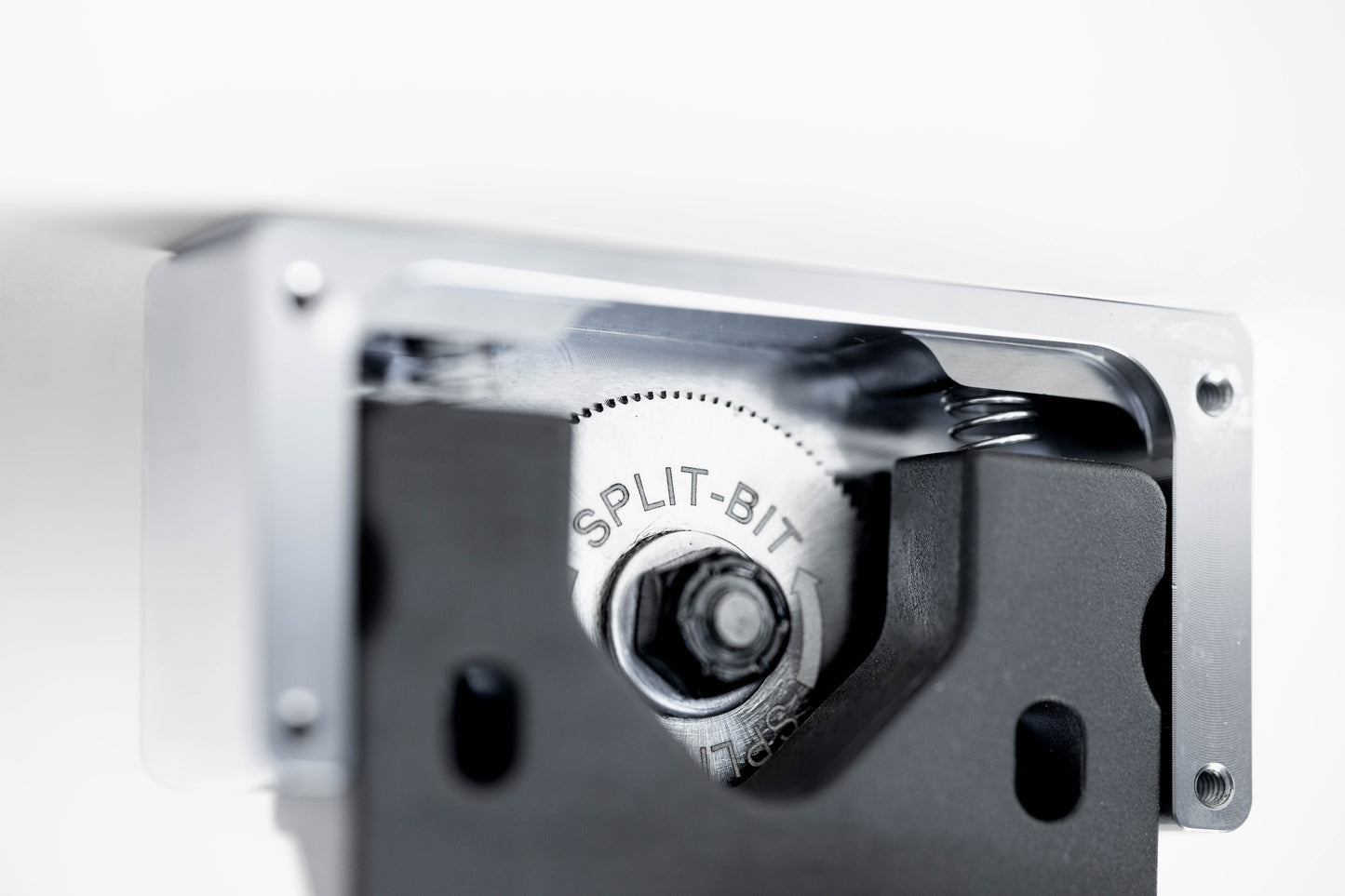 Metallic component with a bolt labeled 'SPLIT-BIT' on a white background